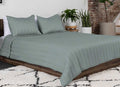 Arctic Aire•MAX Channel Coverlet lifestyle on bed shown in Aloe#choose-your-color_aloe