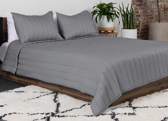 Arctic Coverlet lifestyle in bedroom #choose-your-color_charcoal