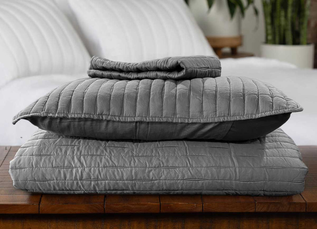 Arctic Quilt Set in charcoal stacked to show comforter, and two pillow shams which are included in set#choose-your-color_charcoal