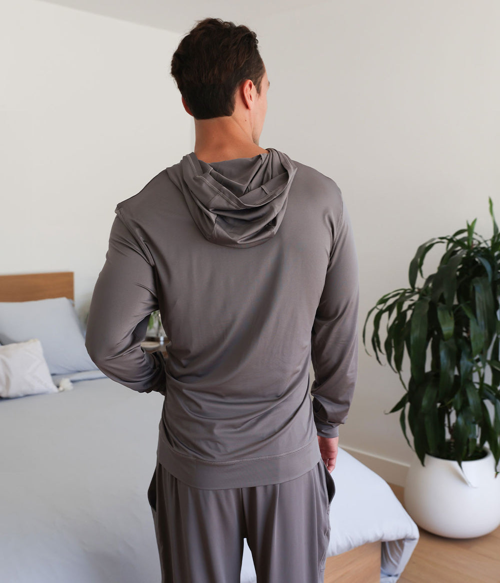 Model wearing graphite SHEEX Men's Hoodie #choose-your-color_graphite