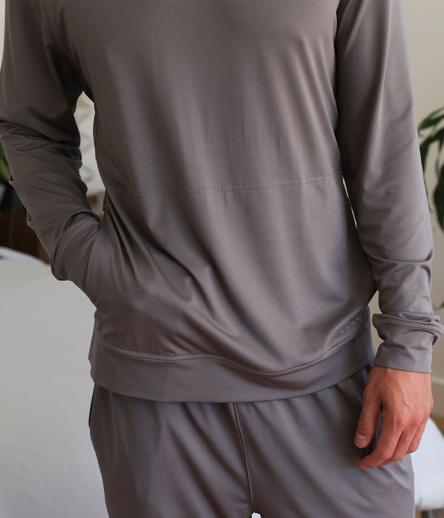 Model wearing graphite SHEEX Men's Hoodie #choose-your-color_graphite