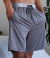 Model wearing SHEEX Men's Lounge Short in Graphite #choose-your-color_graphite