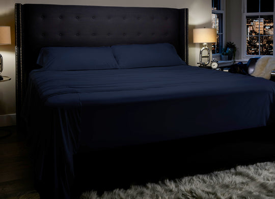 Midnight Label Sheet Set shown on bed #choose-your-color_nightfall