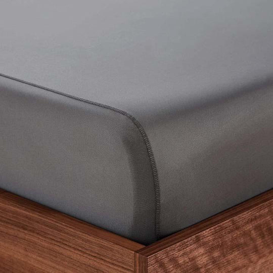 Graphite fitted sheet on bed